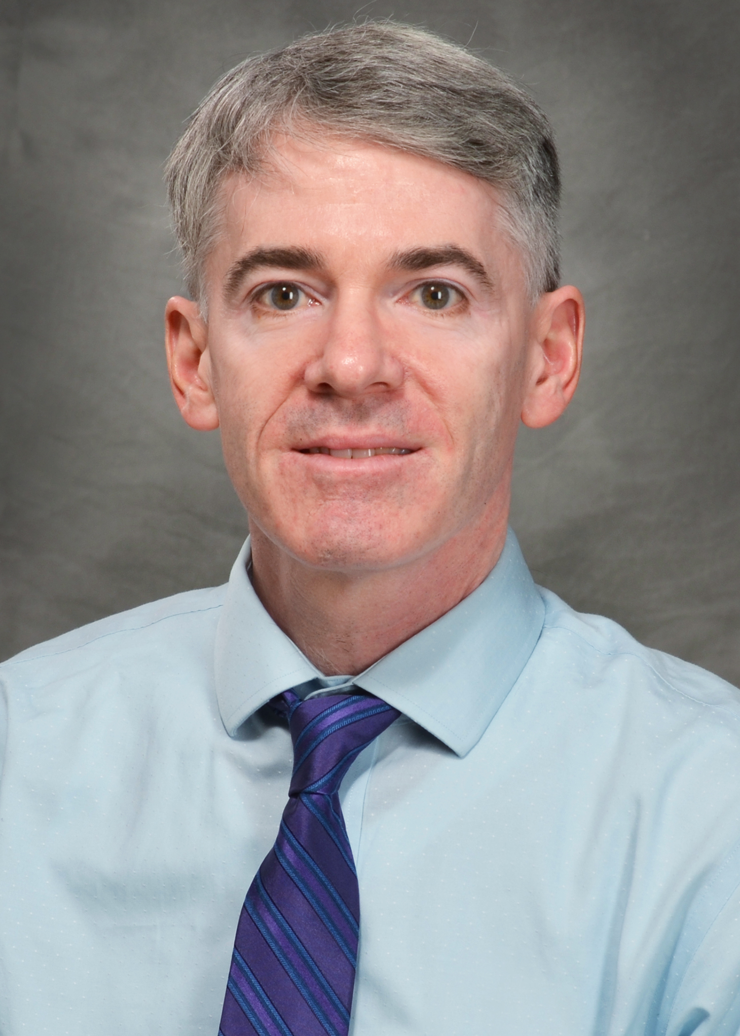 Headshot photo of Stephen Burns
