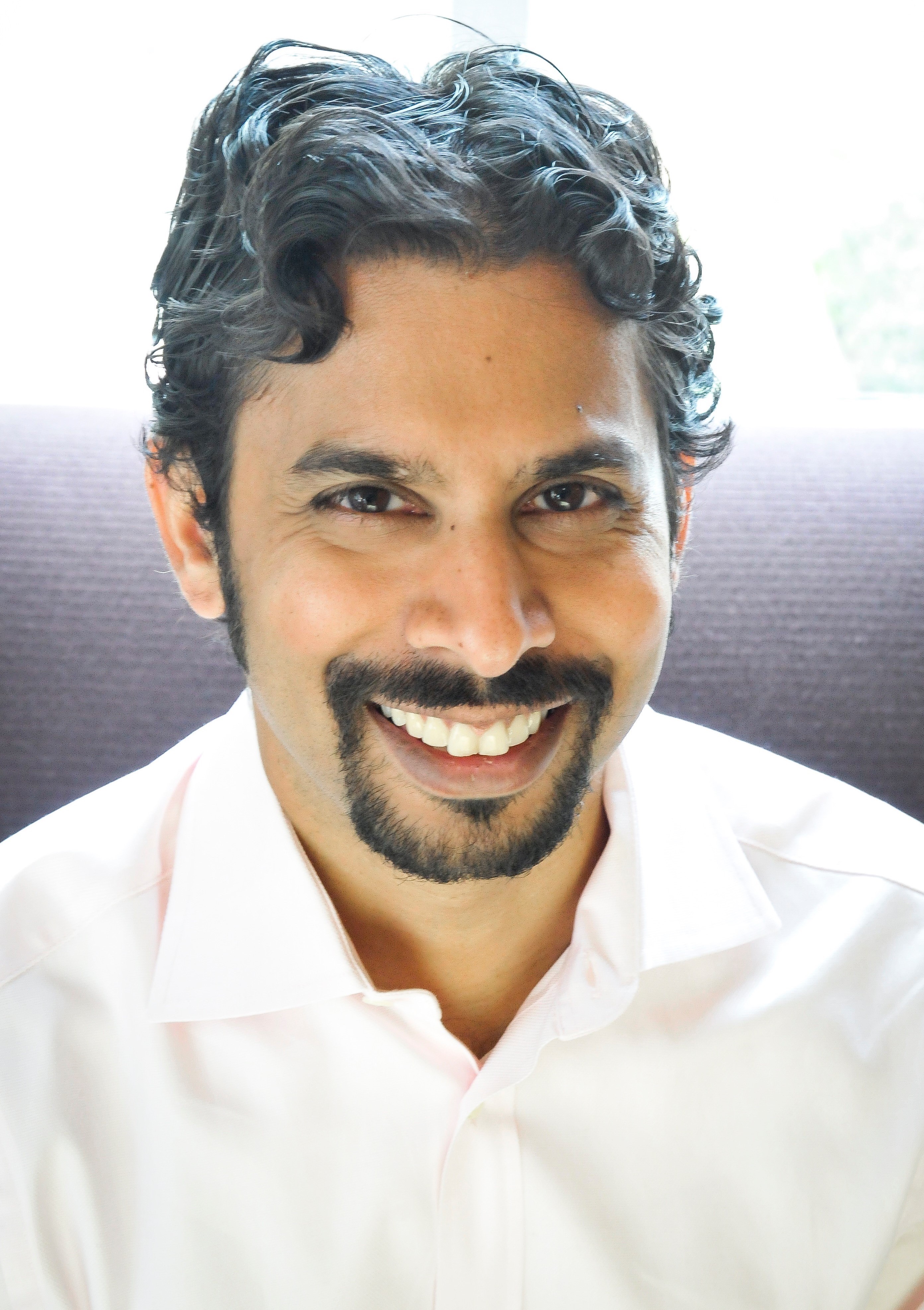 Headshot photo of Pradeep Suri